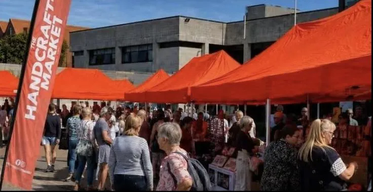 Crowds at a handcraft market in West Kirby